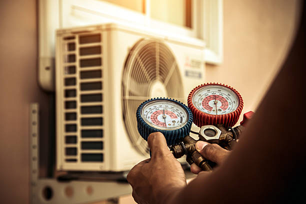 Professional Hvac technician working in Hanson, MA